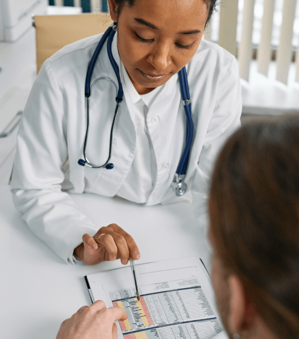 Doctor explaining medical terms to a patient